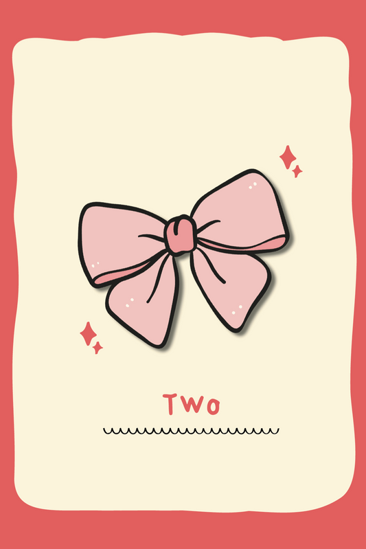 Card with a pink bow and the number 'Two' on a red and beige background